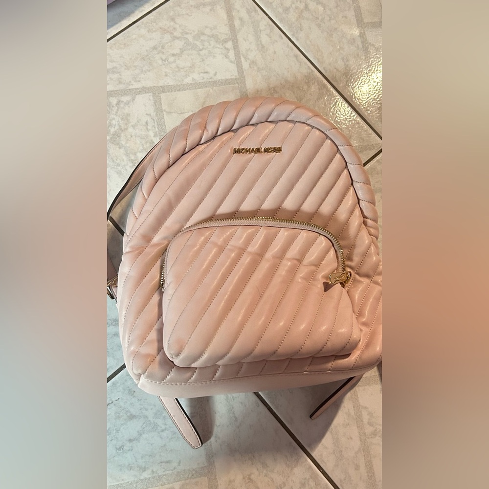 small light pink Michael Kors backpack, quilted leather